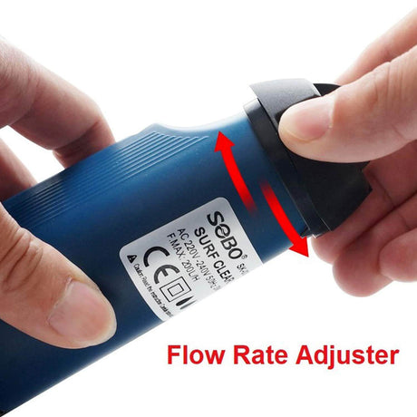 User adjusting the flow rate on the SOBO SK-03 Surface Skimmer for optimal water clarity.