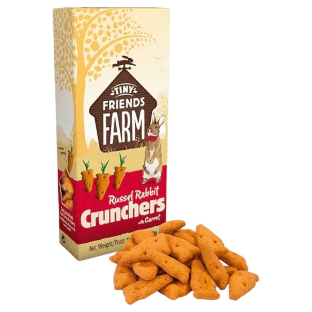 Tiny Friends Carrot Crunchers 120g box with baked treats for rabbits, featuring natural grains and veggies for healthy snacking.