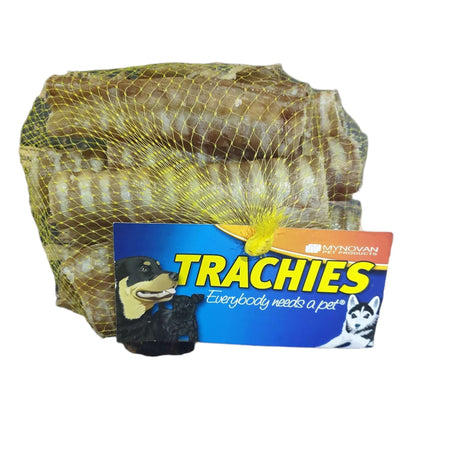 Trachies dog treats in netting packaging, featuring 100% pure beef cow trachea for crunchy chew and extra calcium.